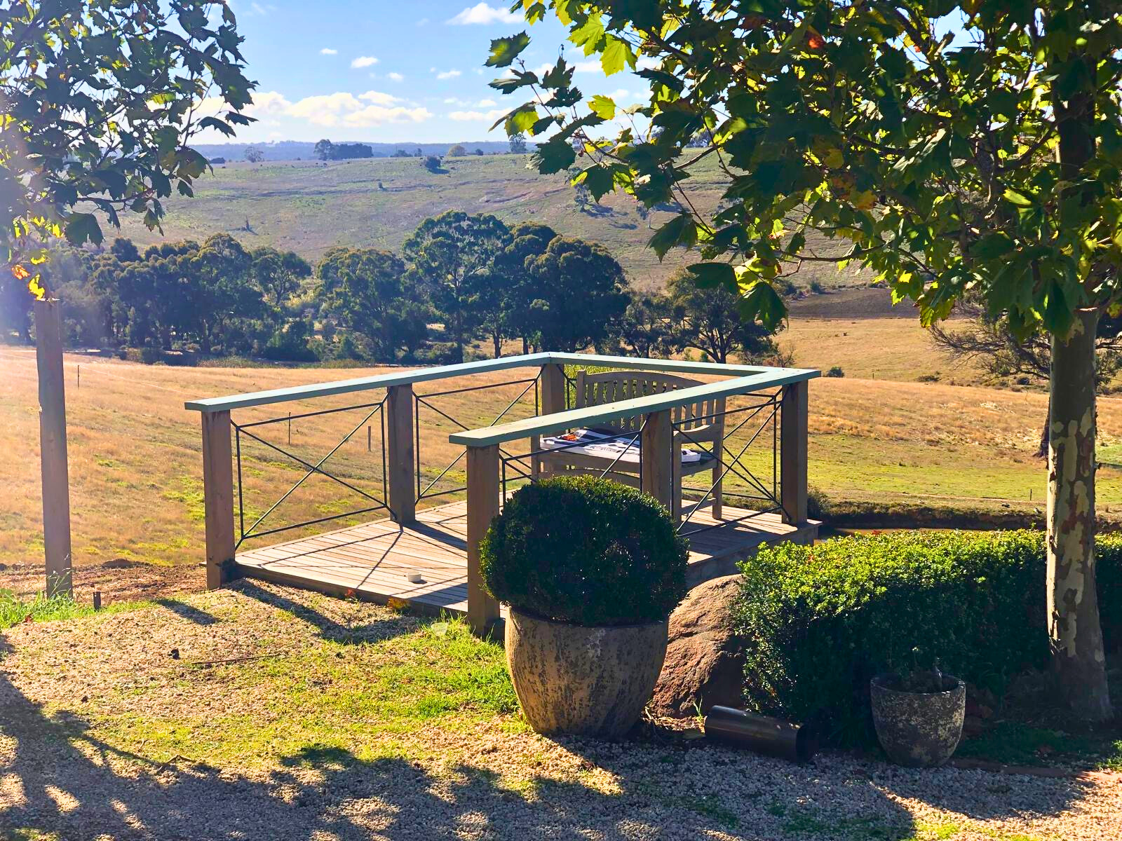 A small wooden structure stands in a field, representing the Follow Through House facility’s serene environment. A small wooden structure stands in a field, representing the Follow Through House (Women’s addiction recovery retreat) facility's serene environment.